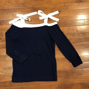 Off the should tie navy sweater